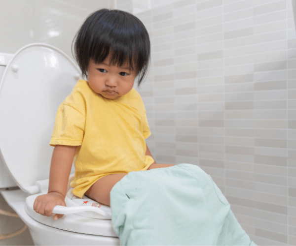 Little kid on toilet