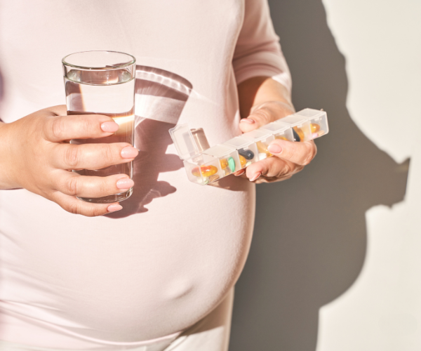 Pregnant mom with nutritional supplements